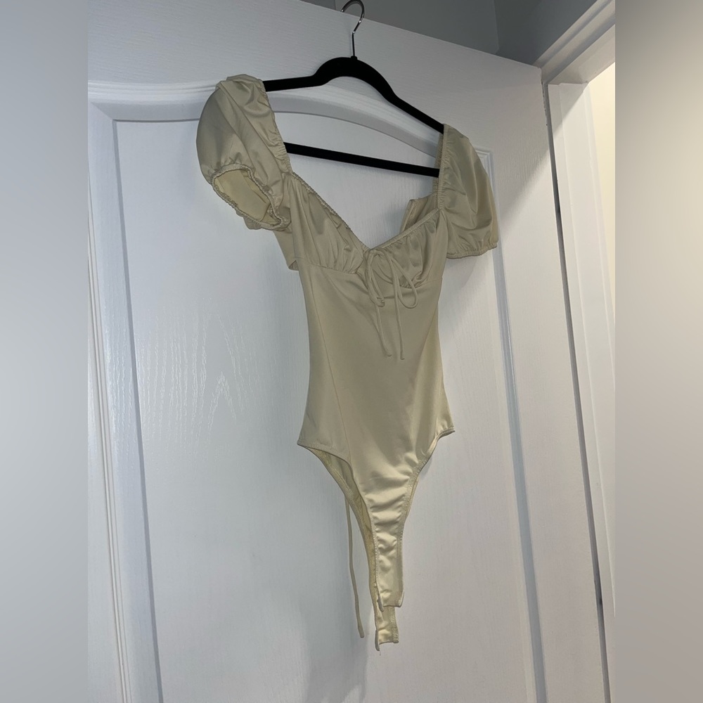 Yellow body suit